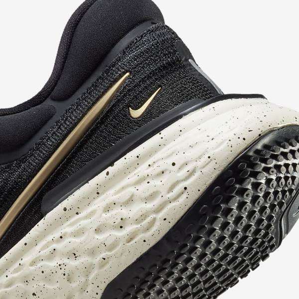 Women's Nike ZoomX Invincible Run Flyknit Road Running Shoes Black / Metal Gold | NK751DNQ